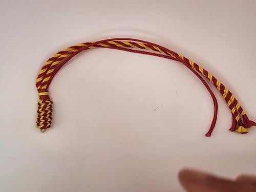 كركوشه سبحه باللون الأحمر و الاصفر