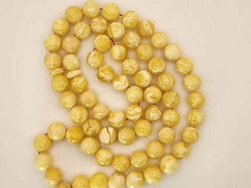 سبحه كهرمان كلنقرادي مشخط بياض كامل 42 جرام