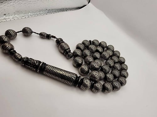 سبحه يسر مطعمه بالفضه قص دائري