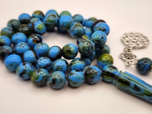 سبحه بكالايت 10 ملي 45 خرزه باللون الأزرق المعرق