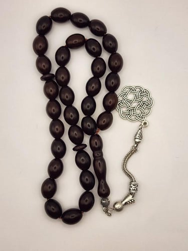 سبحه عوديه بطربزونه 33 خرزه قص زيتوني 12 طول 9.5 ع...