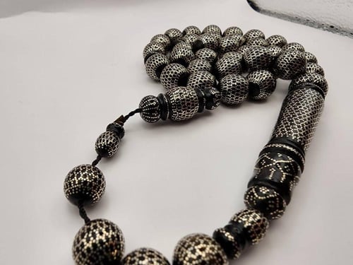 سبحه يسر مطعمه بالفضه قص دائري