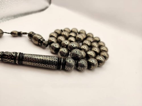 سبحه يسر مطعمه بالفضه قص دائري