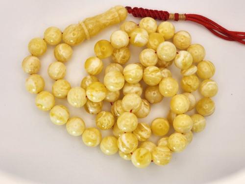 سبحه كهرمان كلنقرادي مشخط بياض كامل 42 جرام