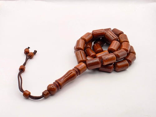 سبحه من خشب الكوك 33 خرزه قص برميلي