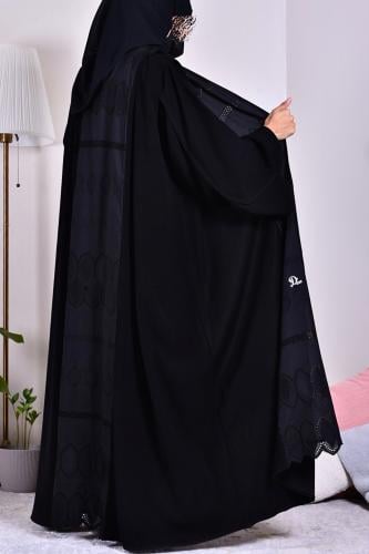 The phrase "عبآية الاناقة" translates to "The robe of elegance" or "The cloak of elegance" in English.