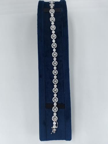 سوار "سيمفونية البريق" الفاخر - فضة 925 بتصميم ألم...