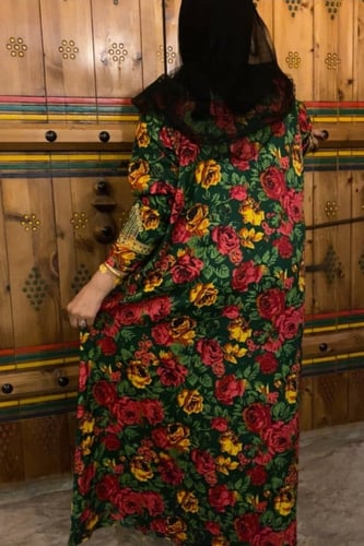 جلابية مطرزةبالصدر ولأكمام.فستان