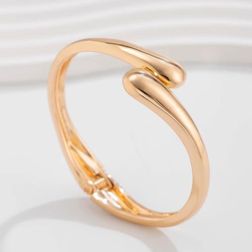 سوار معدني واسع للنساء