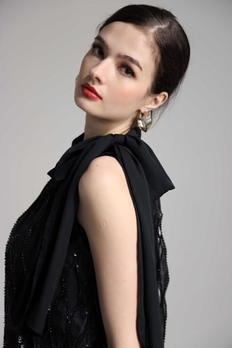 بلوزة كت اورجنزا ترتر اسود