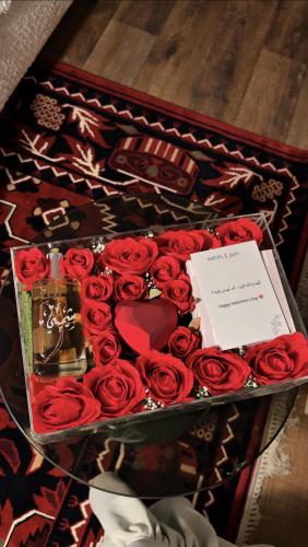Elegant perfume and watch with a heart bracelet with a heart