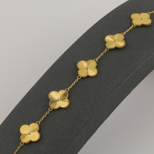 اسوارة ذهب بتصميم النبتة الرباعية - عيار 21