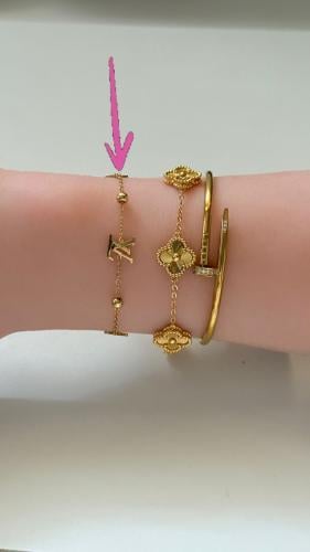 Louis Vuitton gold bracelet, high horse