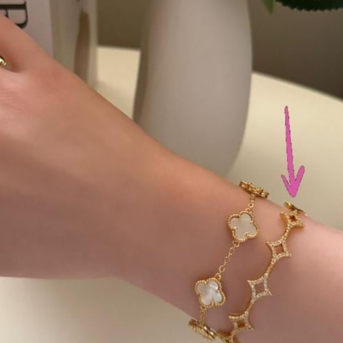 Gold APM bracelet with the ring controls the size