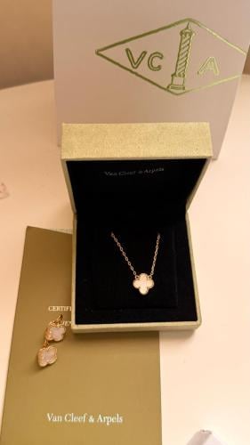 Van Cleef white jewelry set, pendant necklace and...