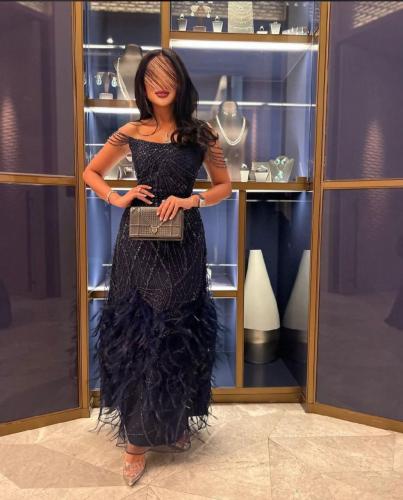 فستان اسود بريش
