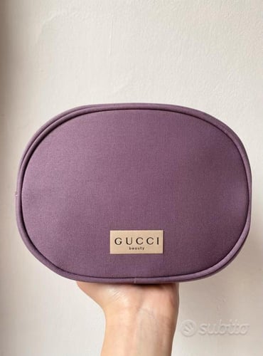 شنطة قوتشي الجديده مع كيس قوتشي الأصلي