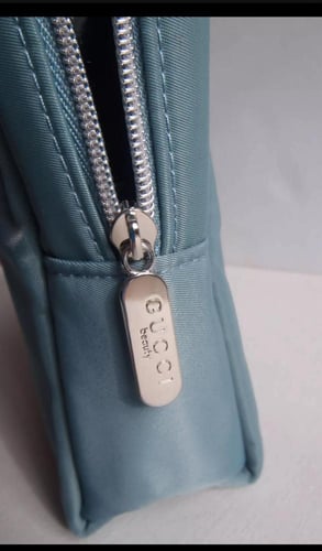 شنطة قوتشي الجديده مع كيس قوتشي الاصلي