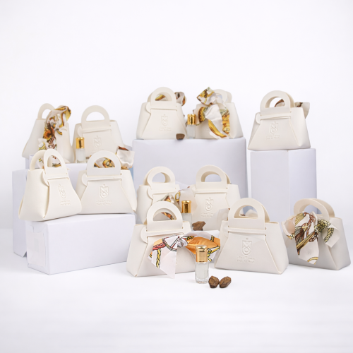 توزيعات مسك ابيض 12 علبه جلدية مع كسره العود ميني...