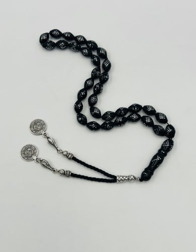 سبحة كوك طبيعي مطعمه بالفضة