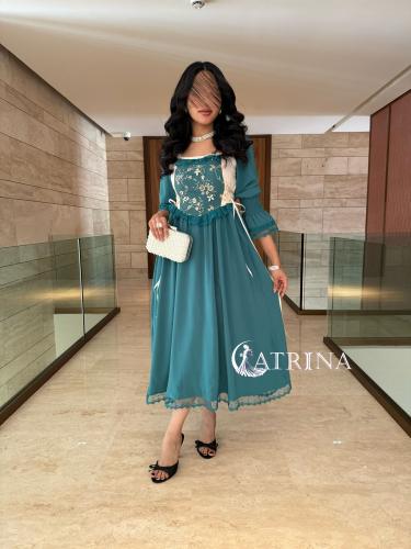 فستان فكتوريا مطرز بالصدر ميد.