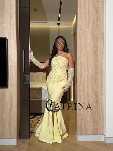 فستان سهرة أنيق بلون الليموني الفاتح بتصميم فاخر