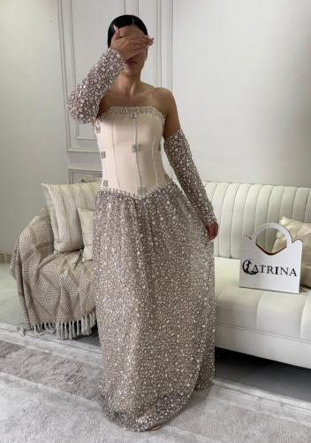 فستان سهرة مرصع بكورسيه باربي وأكمام منفصلة