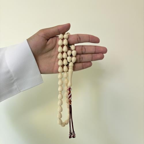 سبحة بكلايت كريمي كركوشة عنابي