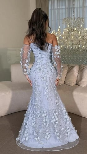 فستان سهرة سماوي فخم بتطريز ورد يدوي