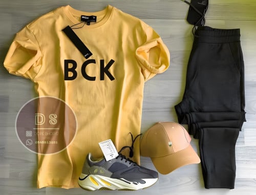 طقم تيشيرت اصفر + بنطلون اسود