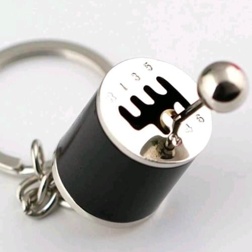 تعليقة على شكل قير سيارة