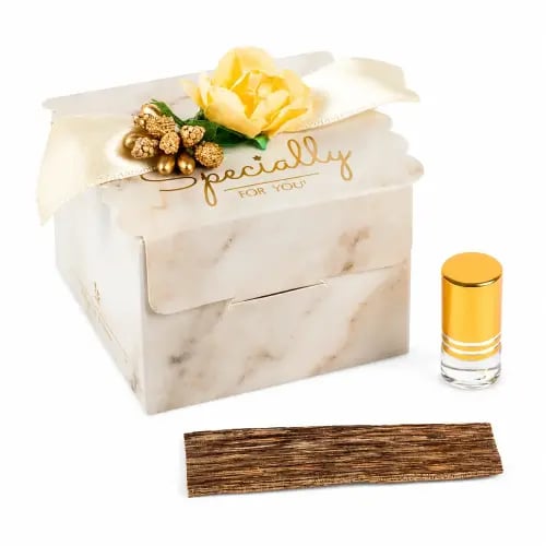 Luxury oud gift sets for occasions – a box with a floral design in elegant beige color