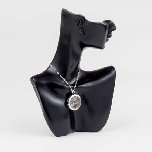 قلادة دهن العود دائرية لون فضي من ستانلس ستيل