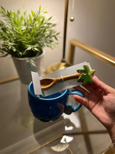 كوب ستيتش مع ملعقة