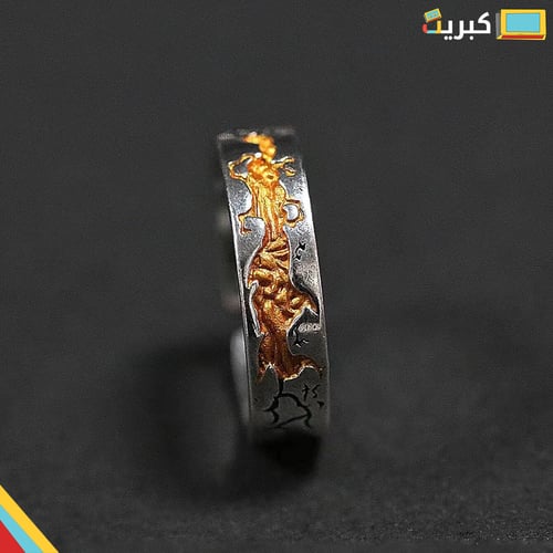 خاتم فضي بنقشة ذهبيه