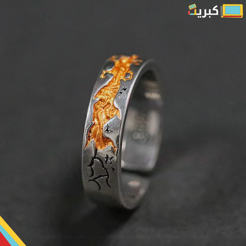 خاتم فضي بنقشة ذهبيه