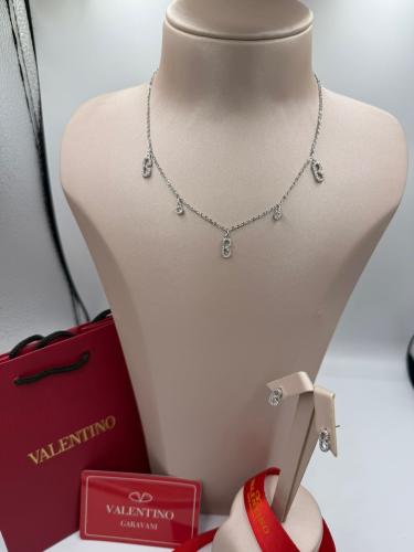 Silver-colored Shukr with Valentino brand