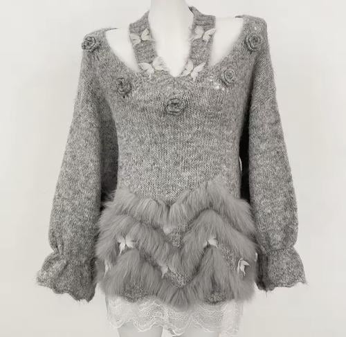 Grey knit with rose + fur accents.