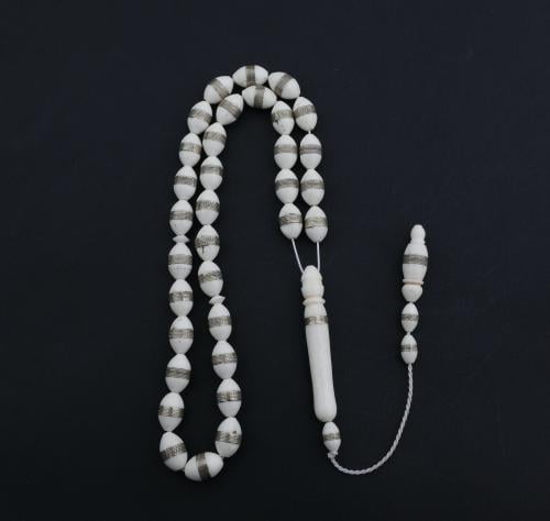 سبحه عظم ابيض بحزام ذهبي