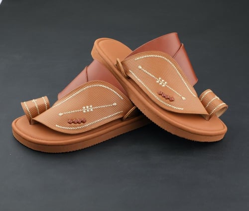 حذاء طبي سكيتشرز لون كموني