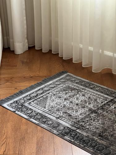 سجادة صلاة - رمادي