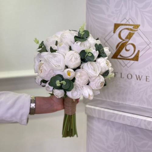 مسكة عروس باللون الابيض