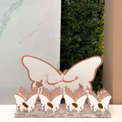 توزيعات عود بثيم الفراشة