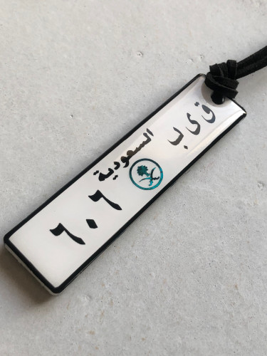 ميدالية سبك بشعار اخضر وجهين وجه ارقام ووجه شعاراو...