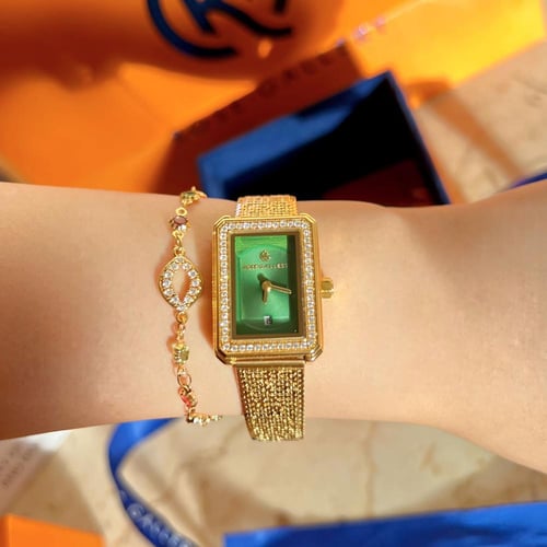 ساعة اتراكشن النسائية الفاخرة استيل ذهبي اخضر