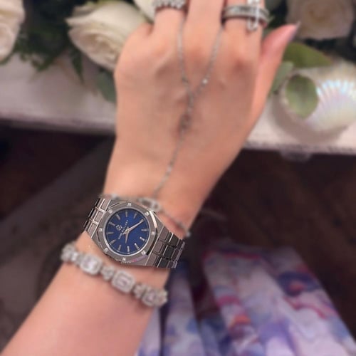 ساعة كاريزما النسائية الفاخرة استيل فضي ازرق