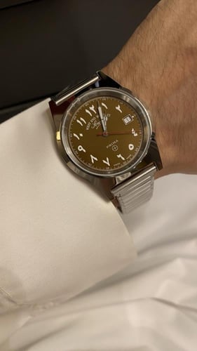 ساعة ويست إند - عربيه اللون بني