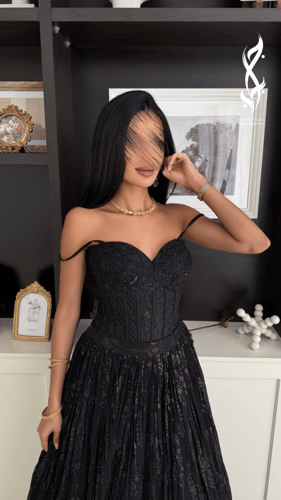 فستان سهرة أسود بتصميم فاخر قطعتين – كورسيه وتنورة...