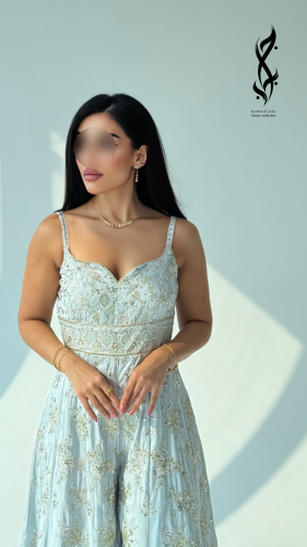 فستان جمبسوت بيبي بلو مطرز ومشكوك بتداخل فضي ذهبي...