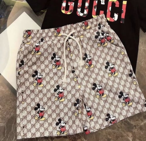 بدلة قوتشي ولادي قطعتين تي شيرت+شورت